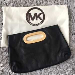 Michael Kors black and gold clutch